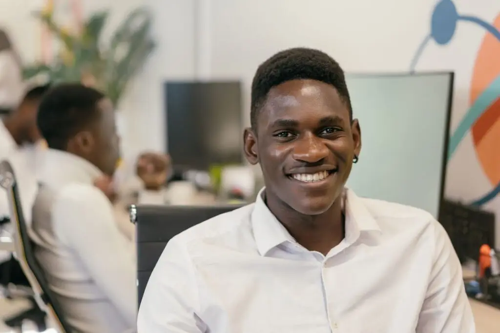 Smiling young professional in a modern office